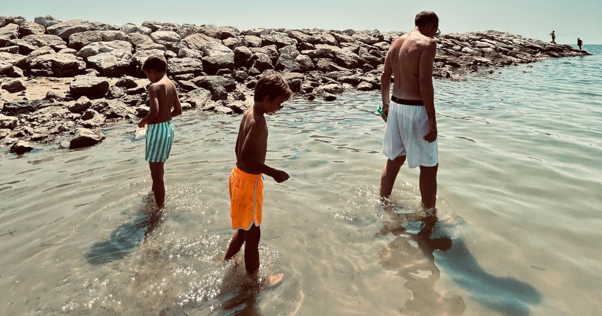 foto famiglia al mare